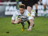 Newcastle Falcons' Alex Lewington scores a try against London Irish during their LV= Cup match on November 10, 2013
