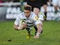 Newcastle Falcons' Alex Lewington scores a try against London Irish during their LV= Cup match on November 10, 2013