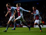 Libor Kozak #27 of Aston Villa celebrates with teammates after scoring his team's second goal past goalkeeper David Marshall of Cardiff during the Barclays Premier League match between Aston Villa and Cardiff City at Villa Park on November 9, 2013