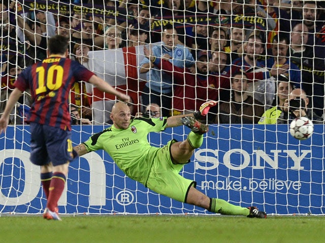 Barcelona's Argentinian forward Lionel Messi scores a penalty during the UEFA Champions league football match FC Barcelona vs AC Milan at the Camp Nou stadium in Barcelona on November 6, vies with 2013.