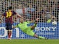 Barcelona's Argentinian forward Lionel Messi scores a penalty during the UEFA Champions league football match FC Barcelona vs AC Milan at the Camp Nou stadium in Barcelona on November 6, vies with 2013.