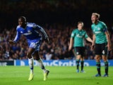 Demba Ba of Chelsea celebrates after scoring his team's third goal during the UEFA Champions League Group E match between Chelsea and FC Schalke 04 at Stamford Bridge on November 6, 2013 