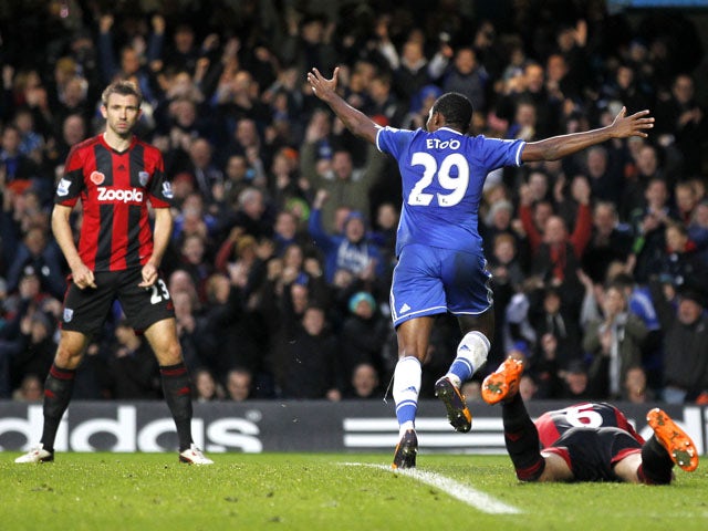 Chelsea's Cameroonian striker Samuel Eto'o celebrates scoring the opening goal during the English Premier League football match between Chelsea and West Bromwich Albion at Stamford Bridge in west London on November 9, 2013