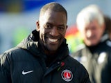 Charlton Athletic manager Chris Powell grins during a Championship match on November 2, 2013