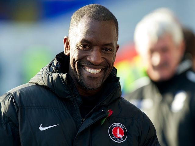 Charlton Athletic manager Chris Powell grins during a Championship match on November 2, 2013