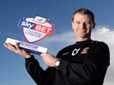 Hartlepool United boss Colin Cooper with his Manager of the Month award for October on November 7, 2013