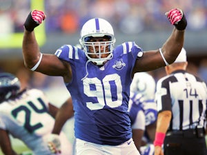 Cory Redding of the Indianapolis Colts reacts after a defensive stop against the Seattle Seahawks at Lucas Oil Stadium on October 6, 2013
