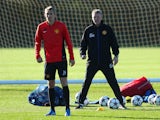 David Moyes the manager of Manchester United and Darren Fletcher look on at Aon Training Complex on November 4, 2013