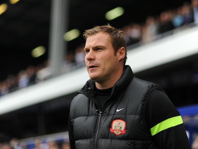 Barnsley manager David Flitcroft looks on from the sidelines on October 5, 2013