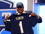 D.J. Fluker of the Alabama Crimson Tide holds up a jersey on stage after he was picked #11 overall by the San Diego Chargers in the first round of the 2013 NFL Draft at Radio City Music Hall on April 25, 2013