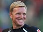 AFC Bournemouth manager Eddie Howe smiles during a pre-season friendly on July 13, 2013