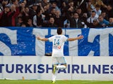Marseille's Florian Thauvin celebrates after scoring the opening goal against Sochaux on November 10, 2013