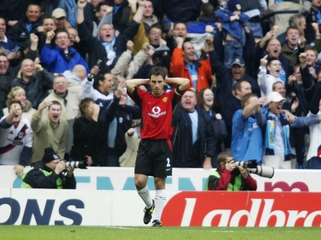 Gary Neville reacts to his mistake that allows Shaun Goater to score for Manchester City on November 09, 2002.