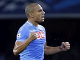 Napoli's Swiss midfielder Gokhan Inler celebrates after scoring a goal during an UEFA Champions League group F football match between SSC Napoli and Olympique de Marseille on November 6, 2013