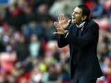 Sunderland manager Gus Poyet gestures on the touchline during the match against Man City on November 10, 2013