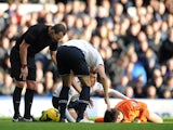 Hugo Lloris of Tottenham Hotspur lies injured during the Barclays Premier League match between Everton and Tottenham Hotspur at Goodison Park on November 03, 2013