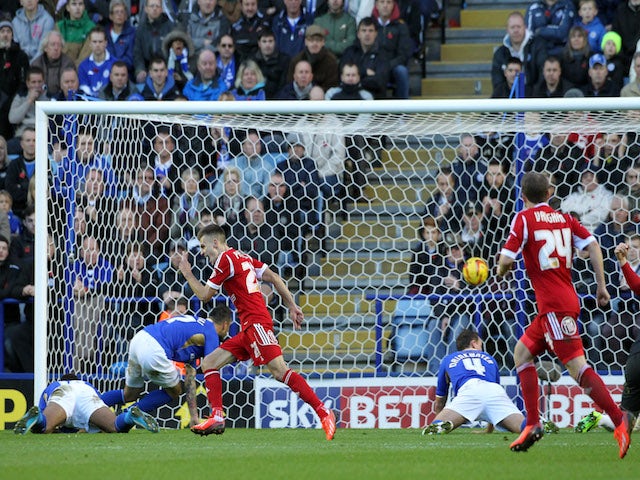 Nottingham Forest's Jamie Paterson celebrates Simon Cox's goal during the Sky Bet Championship match against Leicester City on November 9, 2013