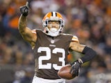 Cornerback Joe Haden of the Cleveland Browns celebrates after catching and interception during the first half against the Baltimore Ravens at FirstEnergy Stadium on November 3, 2013