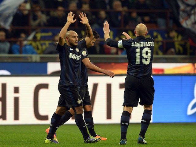 Jonathan of FC Inter Milan celebrates scoring the first goal during the Serie A match between FC Internazionale Milano and AS Livorno on November 9, 2013