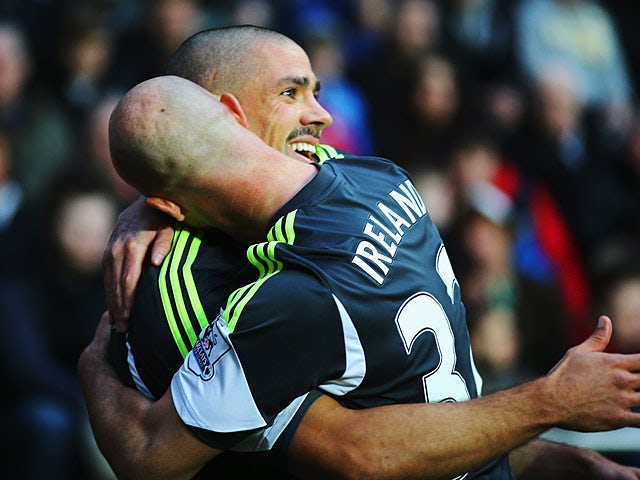 Stoke's Jonathan Walters celebrates with team mate Stephen Ireland after scoring the opening goal against Swansea on November 10, 2013