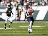 Julian Edelman of the New England Patriots runs against the New York Jets during their game at MetLife Stadium on October 20, 2013