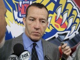 Head coach Kevin Dineen of the Florida Panthers talks to the media following their 4-0 loss against the Ottawa Senators at Scotiabank Place on January 21, 2013