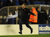 Birmingham City manager Lee Clark celebrates down the touchline during the League Cup match against Stoke City on October 29, 2013