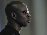 Former French football player Lilian Thuram gives a speech during the presentation of his book 'Mes Etoiles Noires' (My Black Stars) on October 25, 2012 