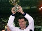 Luis Figo of Real Madrid with the European Footballer of the Year award before the Primera Liga match between Real Madrid and Oviedo on January 14, 2001