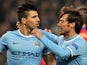 Manchester City's Argentinian striker Sergio Aguero celebrates scoring from a penalty with teammate Spanish midfielder David Silva during the UEFA Champions League football match between Manchester City and CSKA Moscow at The Etihad Stadium in Manchester,