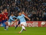 Sergio Aguero of Manchester City scores the opening goal from the penalty spot during the UEFA Champions League Group D match between Manchester City and CSKA Moscow at the Etihad Stadium on November 5, 2013