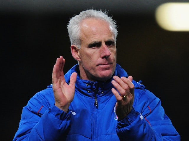 Ipswich Town manager Mick McCarthy applauds during a game on November 27, 2012
