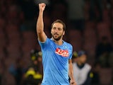Napoli's Argentinian forward Gonzalo Higuain celebrates scoring a goal during the UEFA Champions League group F football match SSC Napoli vs Olympique de Marseille at the San Paolo Stadium in Naples on November 6, 2013