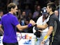 Serbia's Novak Djokovic shakes hands with Switzerland's Roger Federer after Djokovic won the singles final on the eighth day of the ATP World Tour Finals tennis tournament in London on November 12, 2012