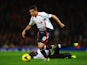 Philippe Coutinho of Liverpool runs with the ball during the Barclays Premier League match between Arsenal and Liverpool at Emirates Stadium on November 2, 2013