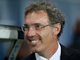 PSG manager Laurent Blanc looks on prior to the UEFA Champions League Group C match between Paris Saint Germain and RSC Anderlecht at Parc des Princes on November 5, 2013