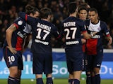 Paris Saint-Germain's players celebrate after Swedish forward Zlatan Ibrahimovic scored a goal during the French L1 football match between PSG and Nice at the Parc des Princes in Paris on November 9, 2013