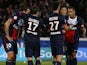 Paris Saint-Germain's players celebrate after Swedish forward Zlatan Ibrahimovic scored a goal during the French L1 football match between PSG and Nice at the Parc des Princes in Paris on November 9, 2013