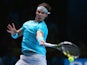 Rafael Nadal of Spain hits a forehand in his men's singles match against David Ferrer of Spain during day two of the Barclays ATP World Tour Finals at O2 Arena on November 5, 2013