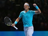 Rafael Nadal of Spain celebrates winning his men's singles match against Stanislas Wawrinka of Switzerland during day three of the Barclays ATP World Tour Finals at O2 Arena on November 6, 2013