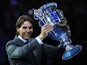 Spain's Rafael Nadal poses with the 2013 ATP World Number One trophy on the sixth day of the ATP World Tour Finals tennis tournament in London on November 9, 2013