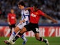 Ruben Pardo of Real Sociedad battles with Luis Antonio Valencia of Manchester United during the UEFA Champions League Group A match between Real Sociedad de Futbol and Manchester United at Estadio Anoeta on November 5, 2013