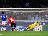 Robin van Persie of Manchester United fails to score from the penalty spot during the UEFA Champions League Group A match between Real Sociedad de Futbol and Manchester United at Estadio Anoeta on November 5, 2013