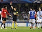 Manchester United's Belgian midfielder Marouane Fellaini receives a red card during the UEFA Champions League Group football match Real Sociedad vs Manchester United at the Anoeta stadium in San Sebastian on November 5, 2013
