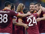 Roma players celebrates after going a goal up against Sassuolo on November 10, 2013