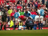 Roy Keane of Manchester United shouts at Alf Inge Haaland of Manchester City following his red card during the FA Carling Premiership match on April 21, 2001