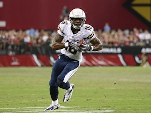 Wide receiver Seyi Ajirotutu #16 of the San Diego Chargers runs with the football after a reception against the Arizona Cardinals during the preseason NFL game at the University of Phoenix Stadium on August 24, 2013
