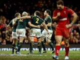 South Africa celebrate a try as George North of Wales looks dejected during an International between Wales and South Africa at Millennium Stadium on November 9, 2013
