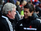Steve Bruce manager of Hull City and Mauricio Pochettino manager of Southampton shake hands prior to prior to the Barclays Premier League match on November 9, 2013