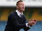 Millwall manager Steve Lomas encourages his side from the touchline on September 28, 2013